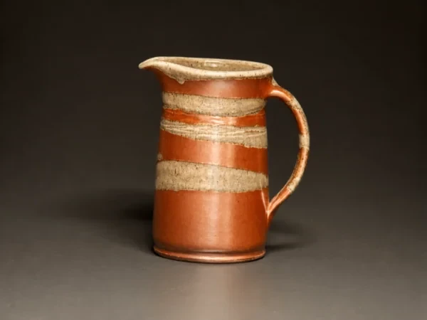 Textured brass and copper salt-fired pitcher